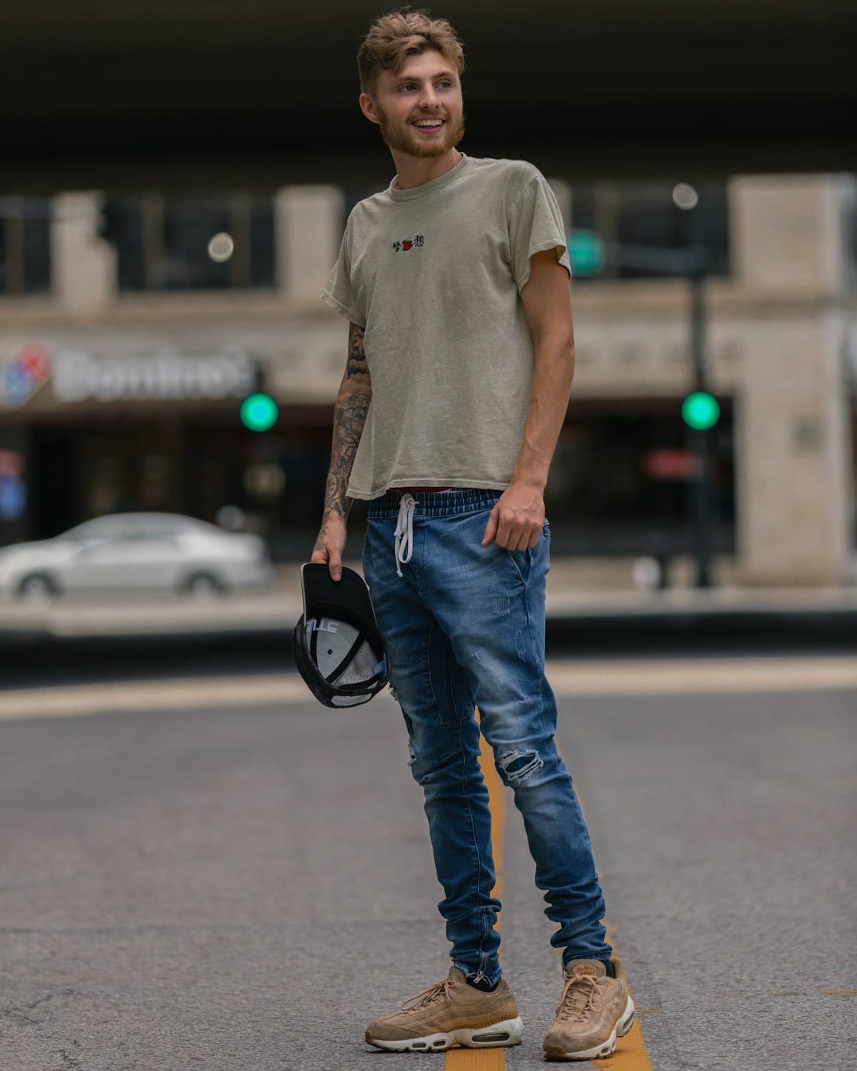Editorial outfit reference showing a tee with denim