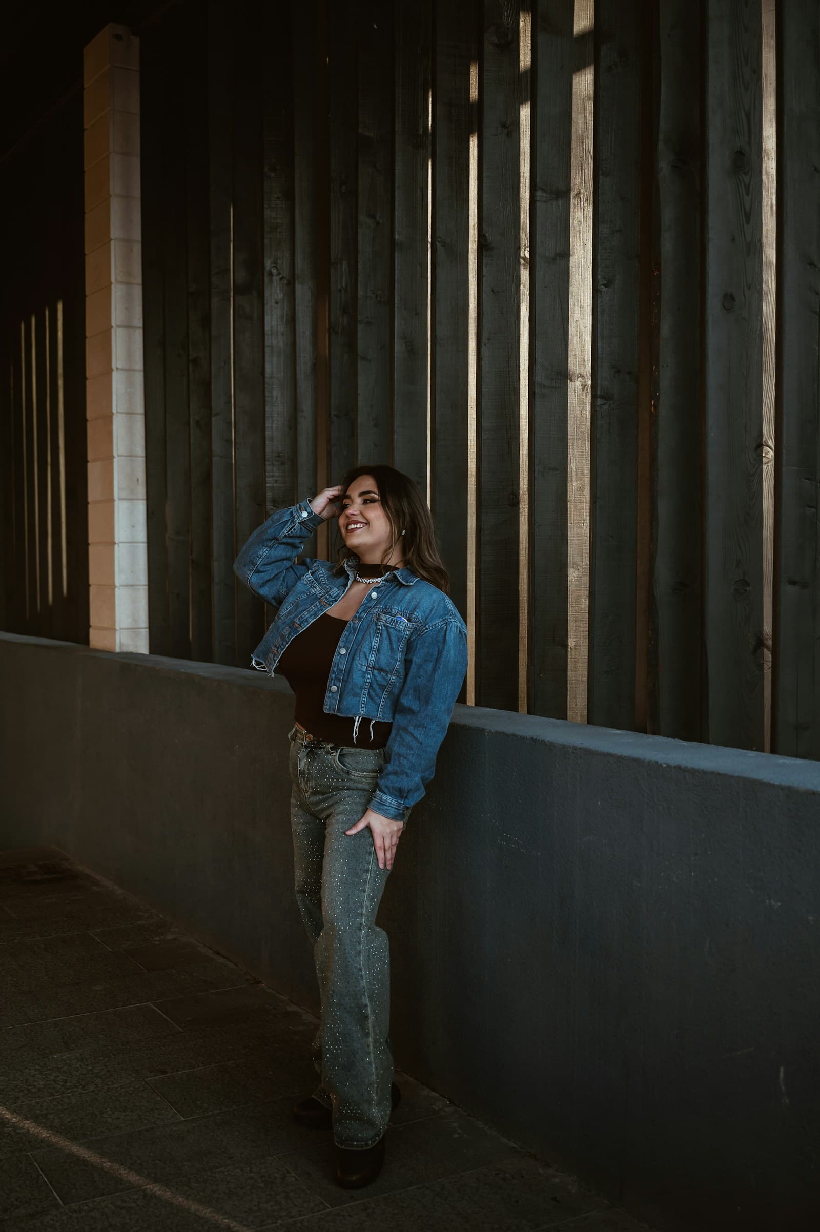 Editorial outfit reference showing a denim layer and jeans